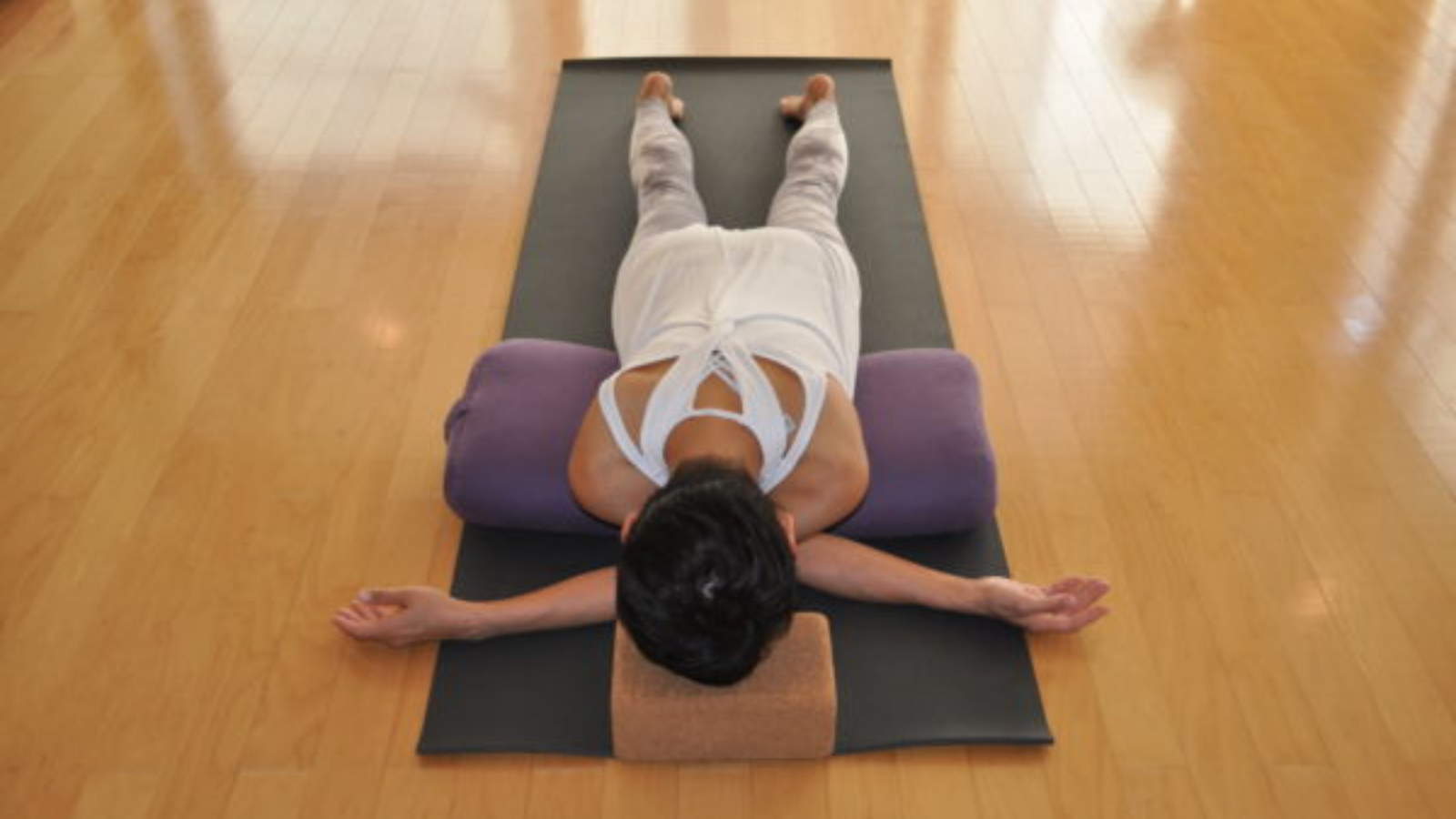 Another camera view of the prop setup for the Restorative Shoulder Release Pose.