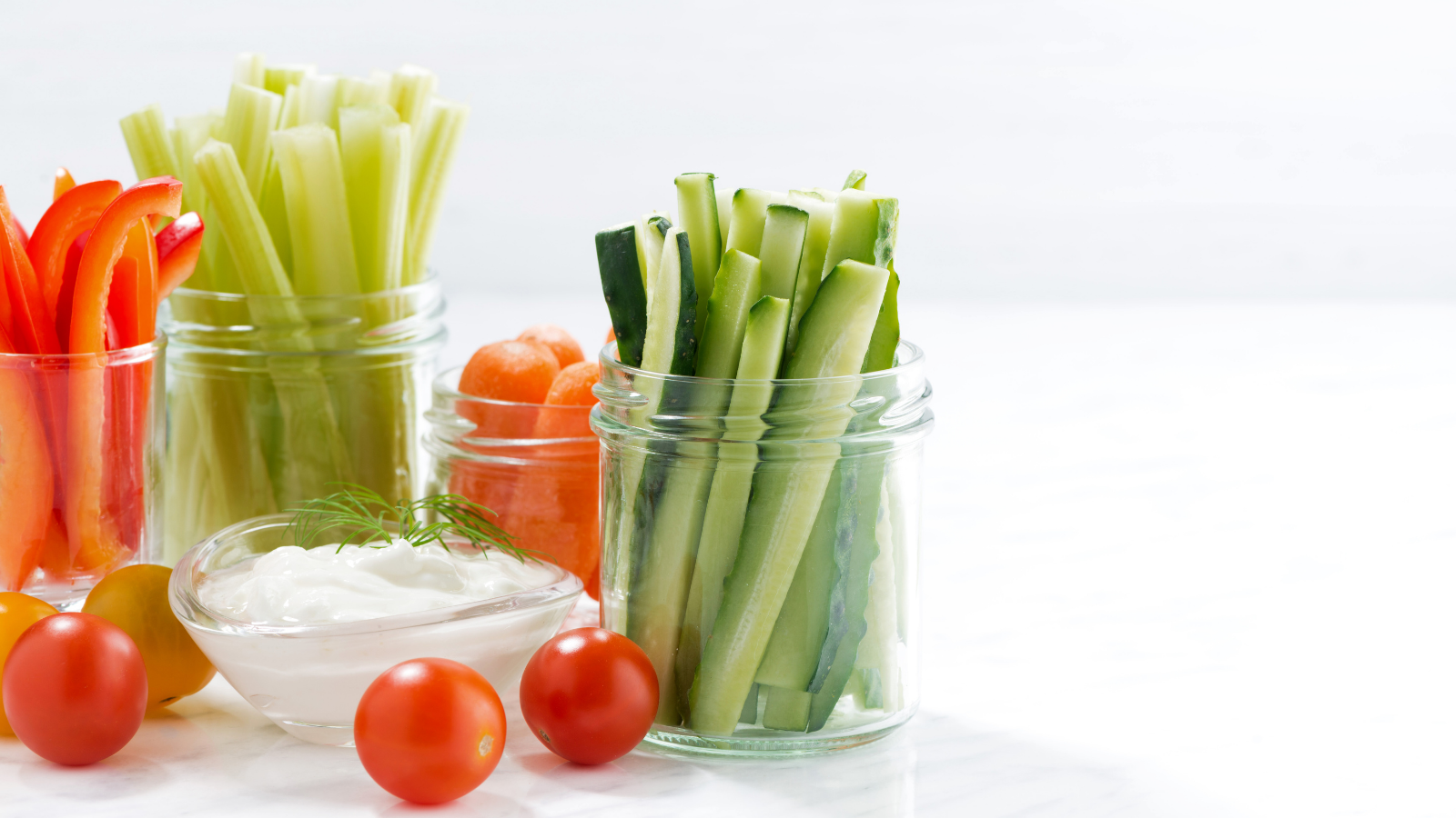 Eating for optimum performance and training to be a runner Healthy snacks, mixed vegetables and yogurt
