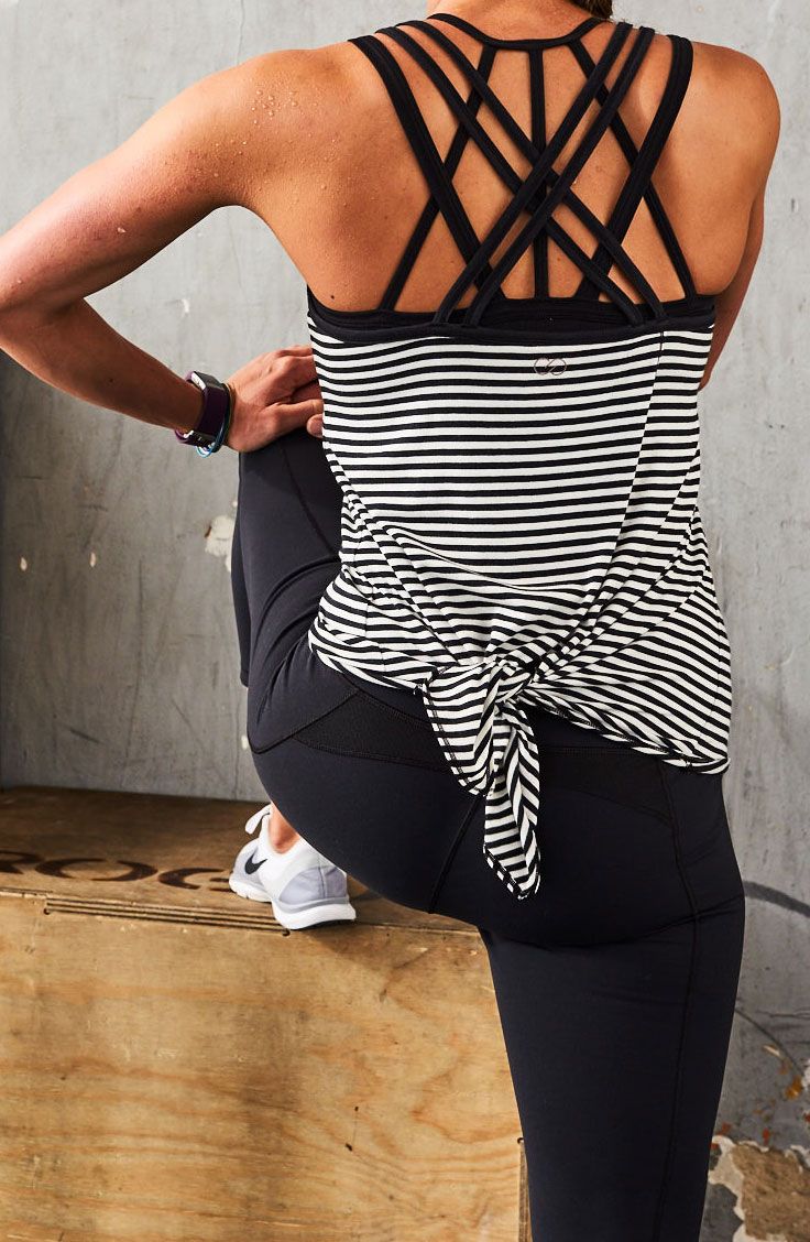 Step you’re your workout up a notch with our strappy back workout tank top. | ...