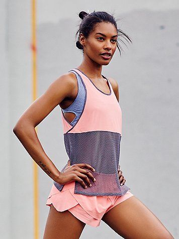 Push It Tank | Hit your stride in this activewear tank, featuring contrast bodic...