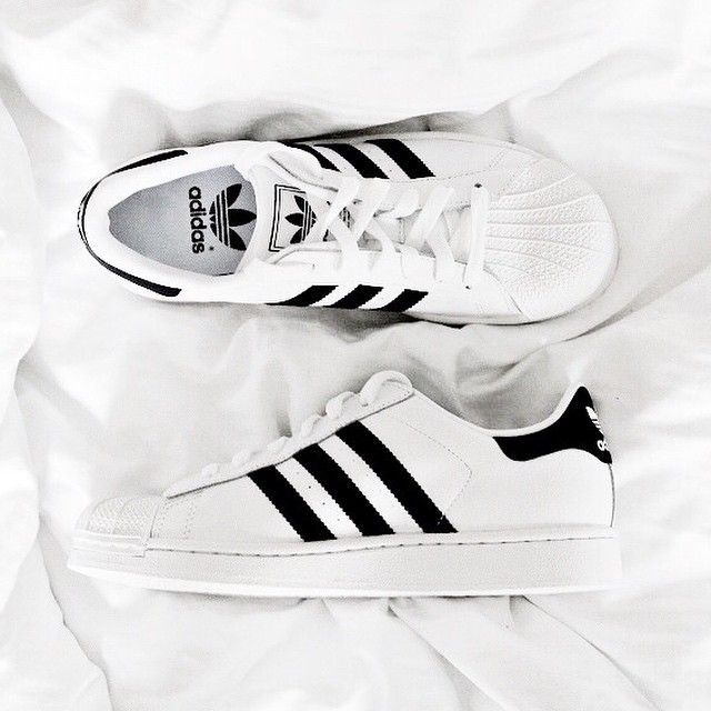 Black and White - classic white Adidas Superstars with black detailing
