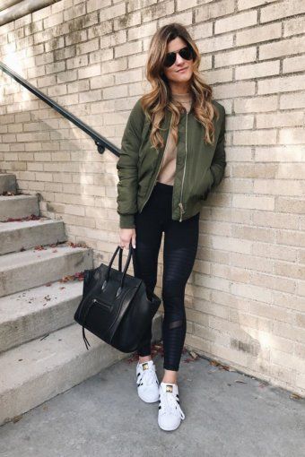 athleisure look with bomber jacket and moto leggings