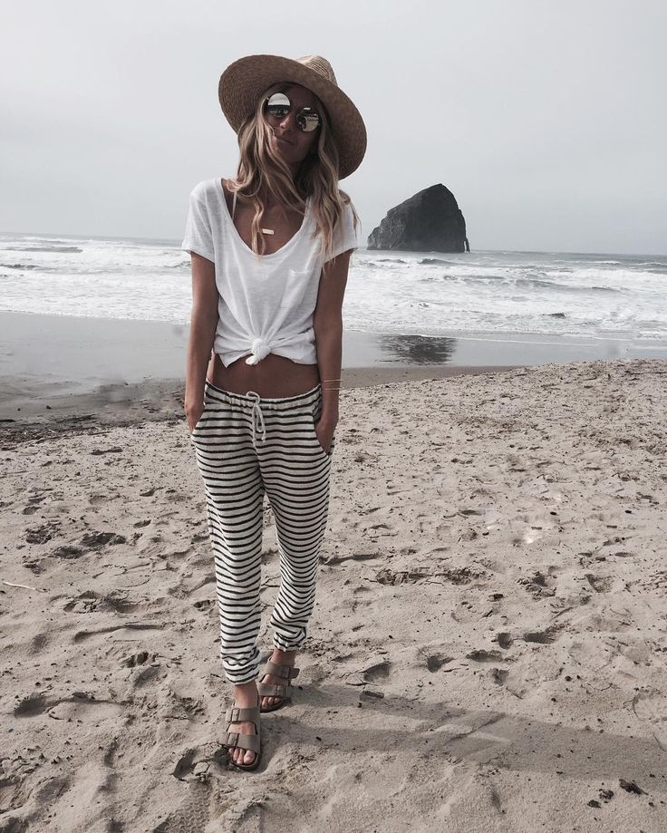 summer fashion. striped pants. beach look. vacation. white t-shirt. hat. sunglas...