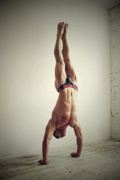 Handstand and a hot muscley guy.