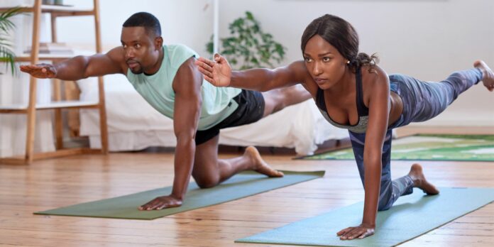 How should a beginner start yoga?