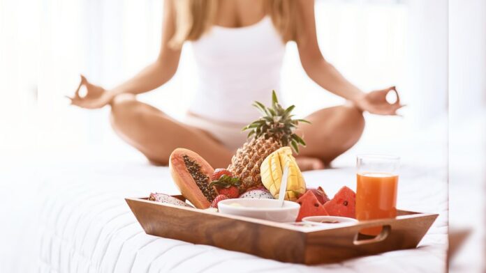 Is it OK to eat before hot yoga?