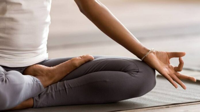 How do you release trauma yoga?