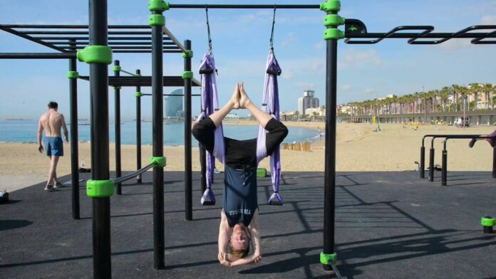 How do I hang my yoga swing?