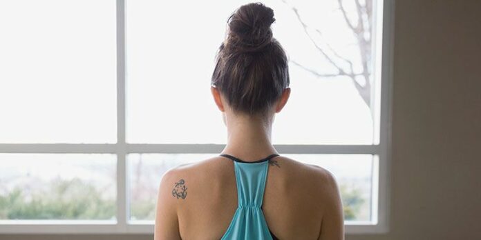 How do I protect my lower back with yoga?