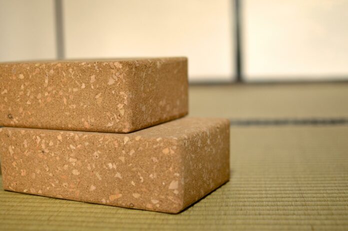 What is the difference between a yoga block and a yoga brick?