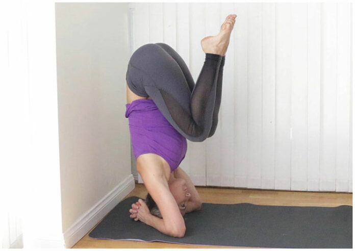 Does headstand reduce belly fat?