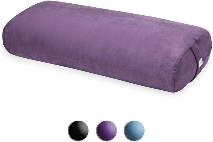 How do you sit on a yoga bolster?