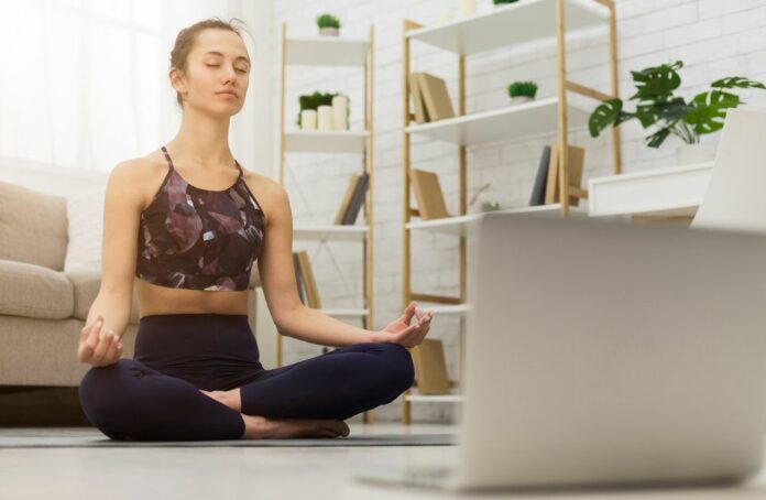 How do I market myself as a yoga instructor?