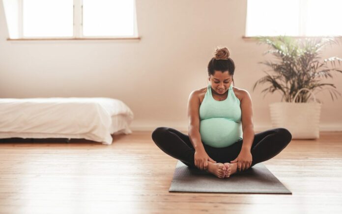 When should I stop prenatal yoga?