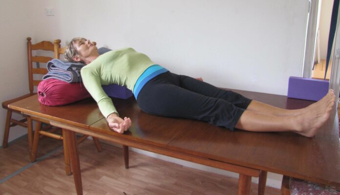 Can I sit Indian style after hip replacement?