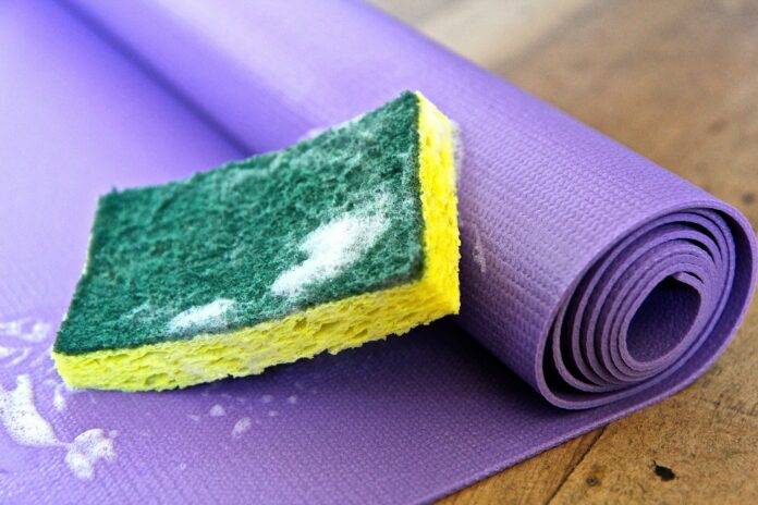 What should I clean my yoga mat with?