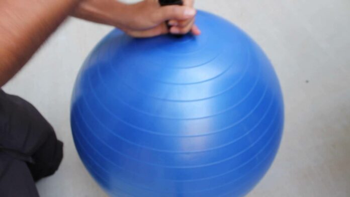 How do you put a plug in an exercise ball?