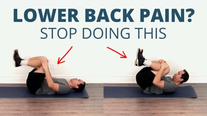 How should I sit with lower back pain?