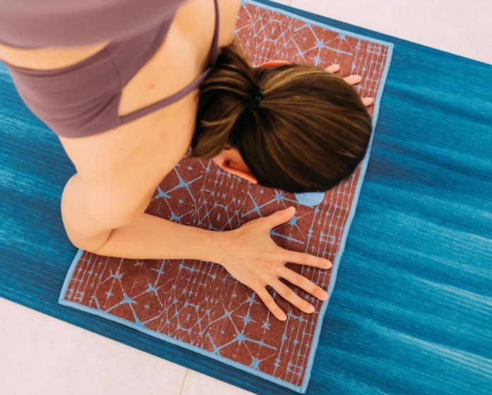How often should you wash your yoga towel?