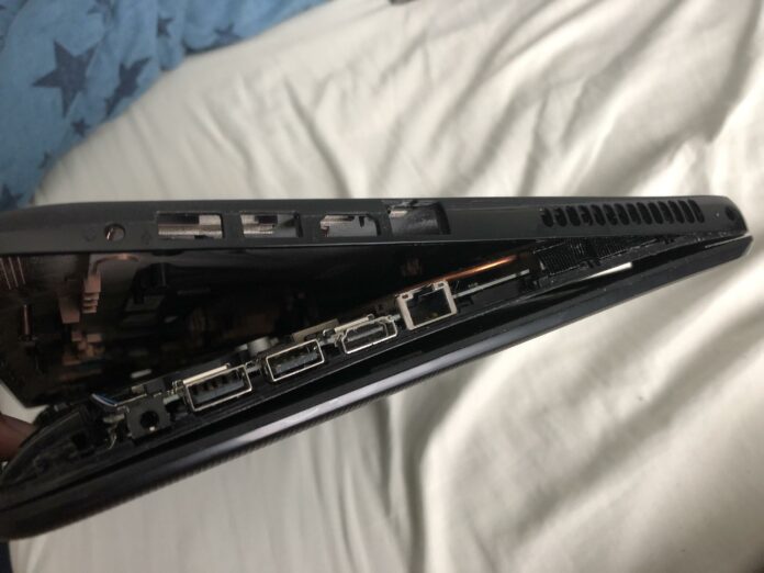 How do you open a HP laptop?