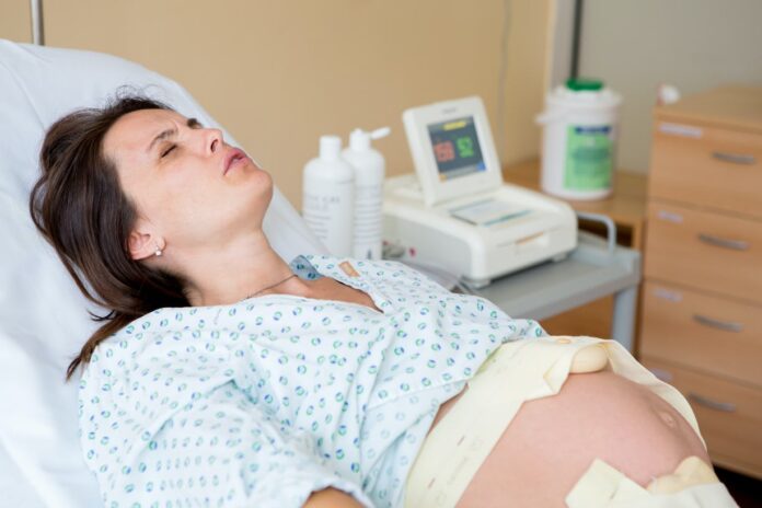 What is the pain equivalent to giving birth?