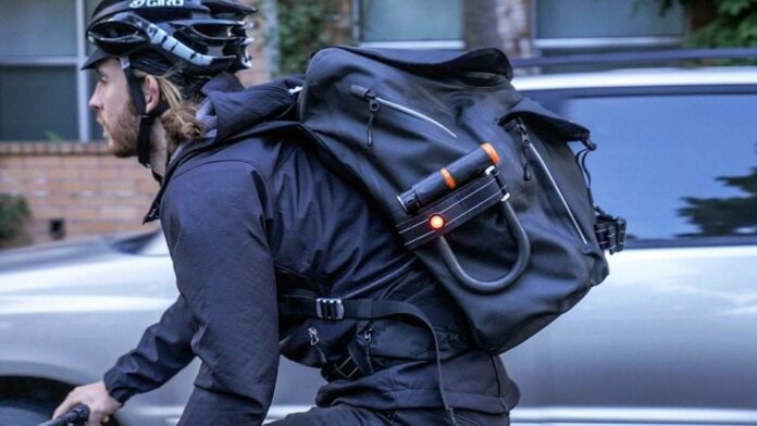 Why do bikers wear backpacks?