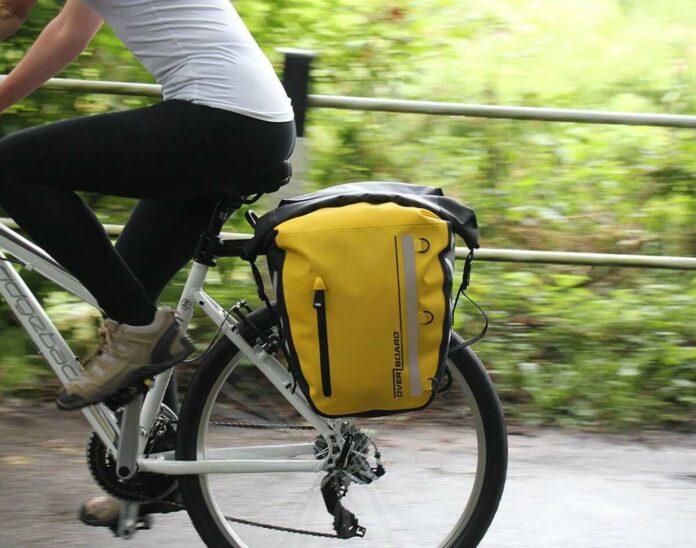 Can I ride a road bike with a backpack?