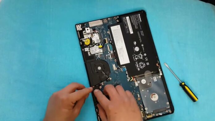 How do I remove the battery from my laptop yoga?