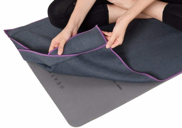 Is a yoga mat or towel better?