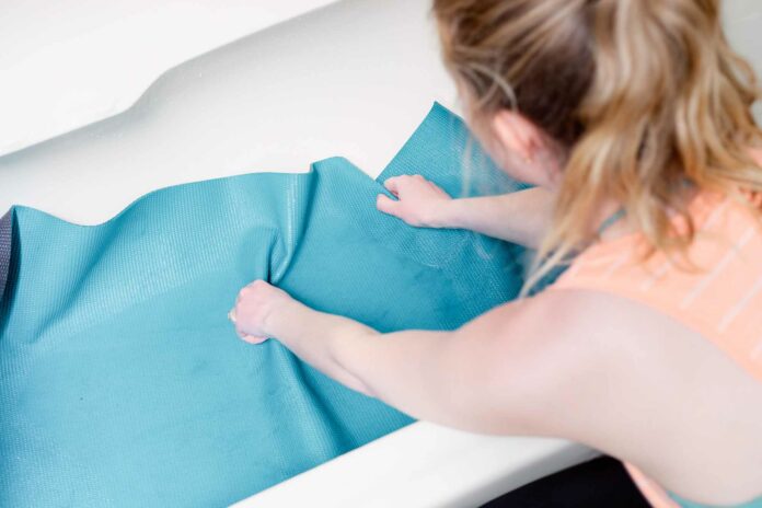 Can I use a yoga towel instead of a yoga mat?