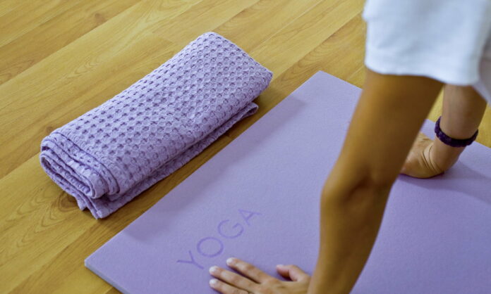 How often should you wash yoga towel?